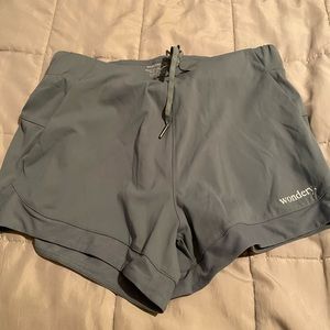 Light green/grey shorts with drawstring waist